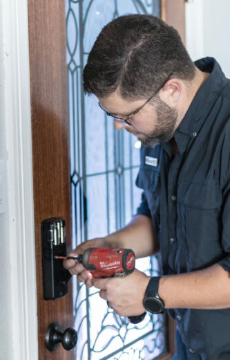 Handyman Installing a smart lock